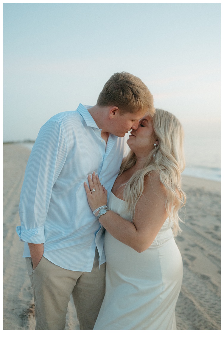 an almost kiss with couple on the beach at sunrise in florida