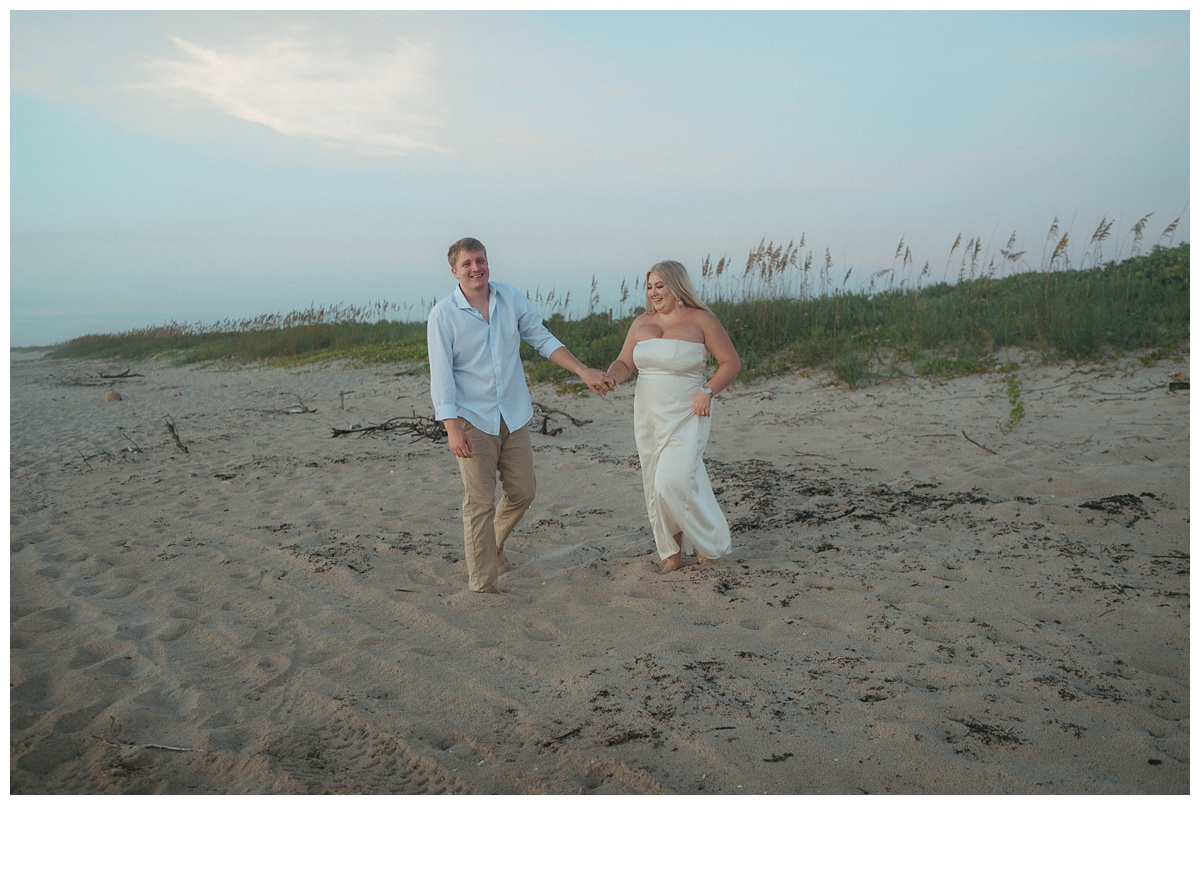 fun bride and groom laughing and smiling at sebastian florida beach