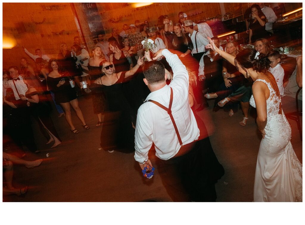 fun and unique shutter drag during wedding reception reception