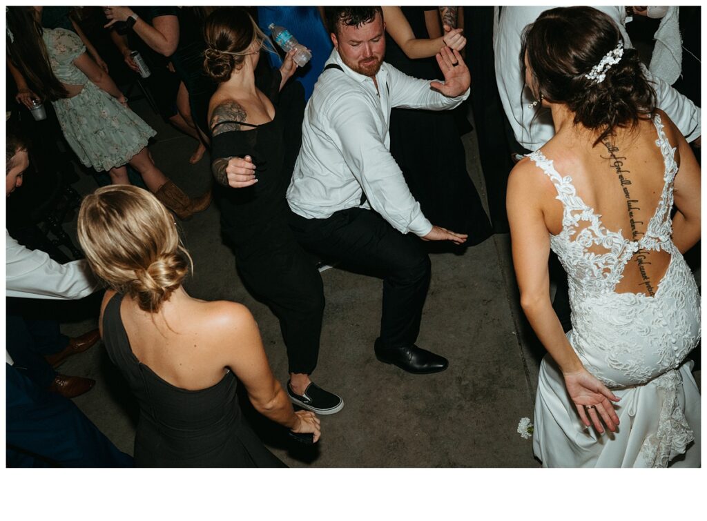 groom dancing at wedding