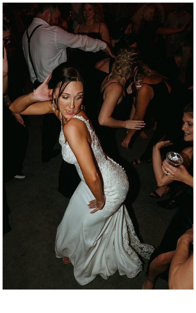 fun bride dancing photo