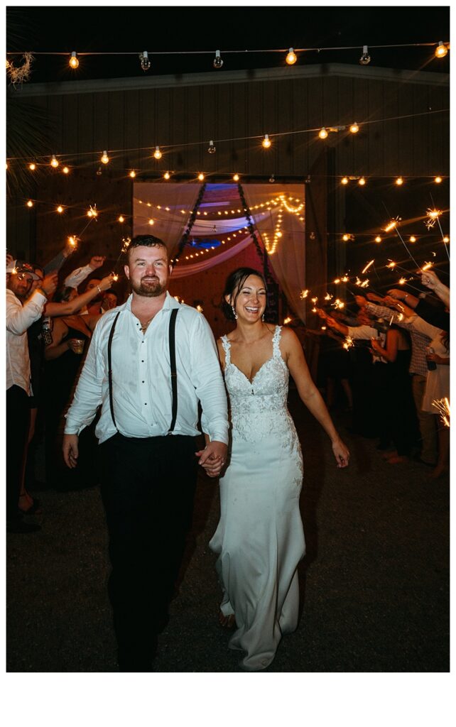 bride and groom laughing during grand exit