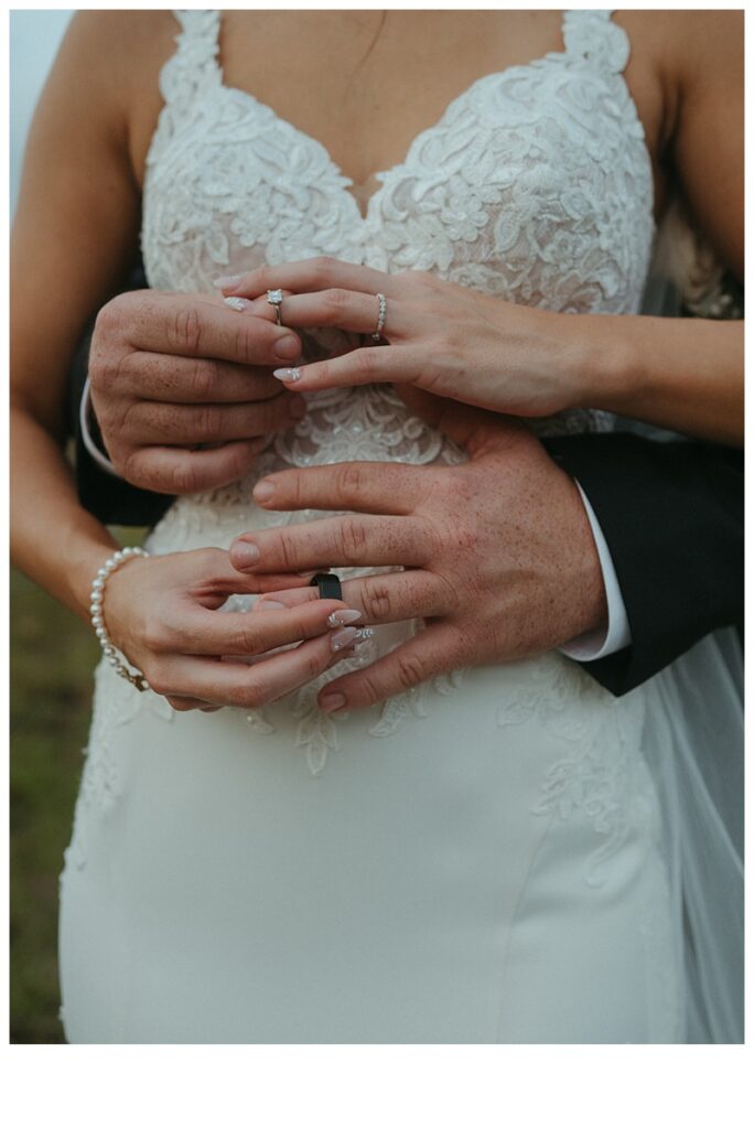 detail ring photo on bride and groom