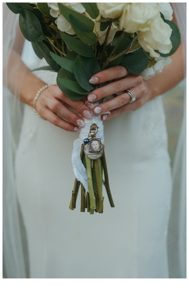 detail photo of brides bouquet and photo of grandmother