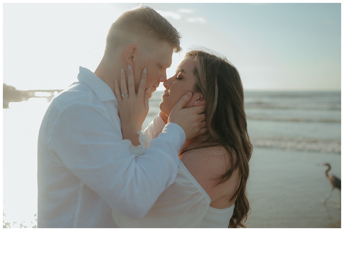 bride and groom intimate photo onthe beach at jetty park