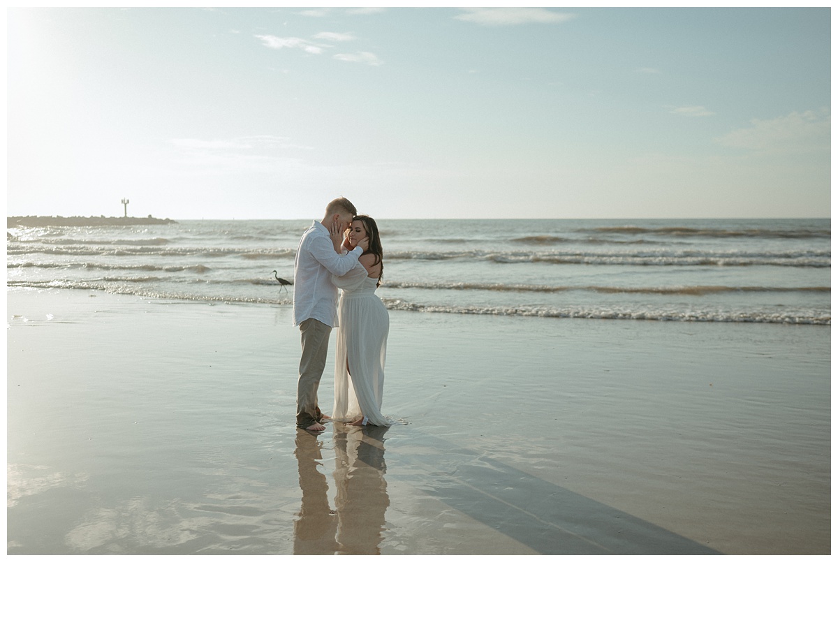 bride and groom intimate photo onthe beach at jetty park