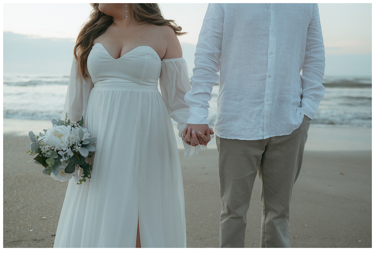 unique up close bride and groom holding hands