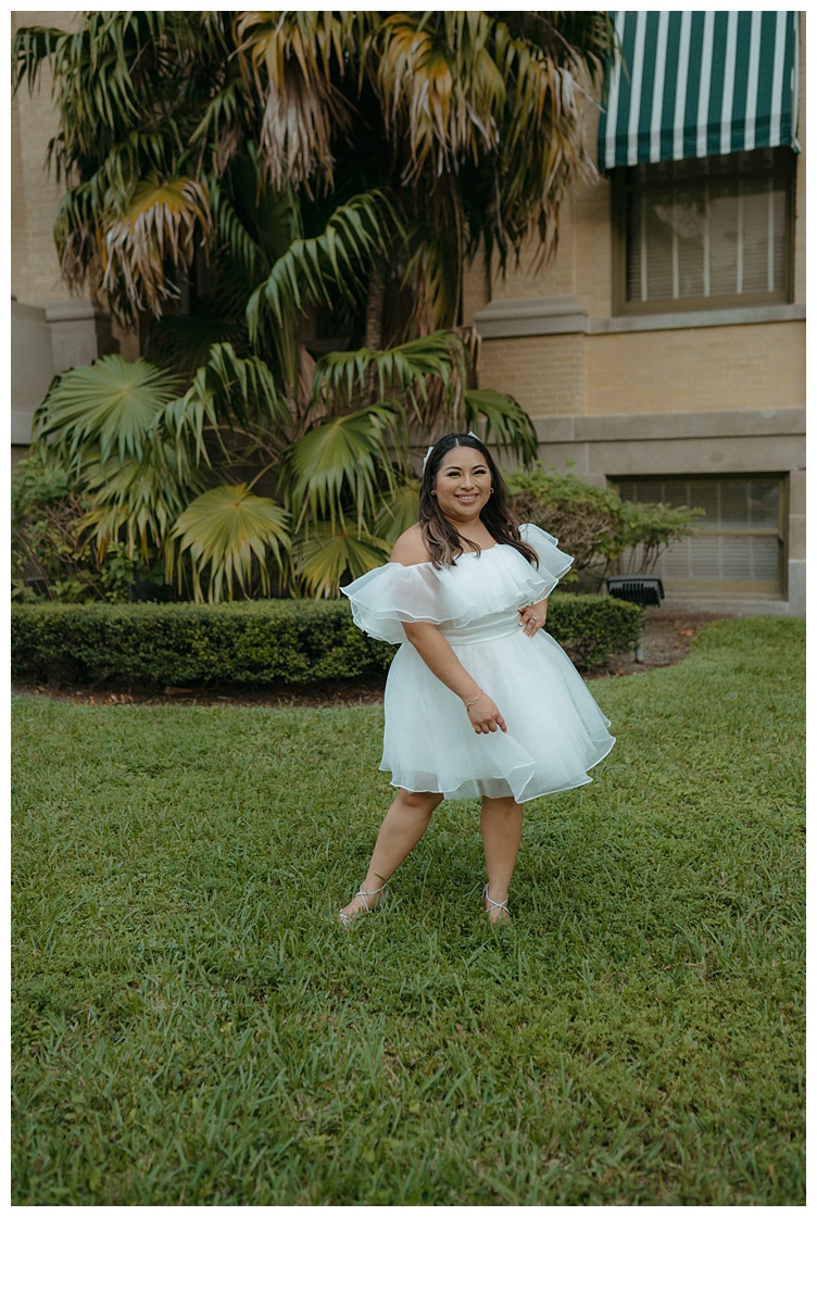 bride twirling dress on lawn in downtown palm beach