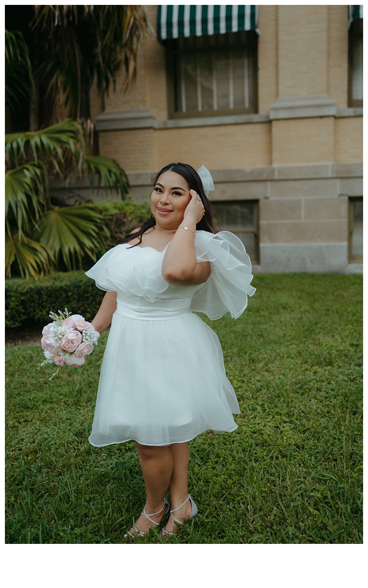 bride fixes her hair 