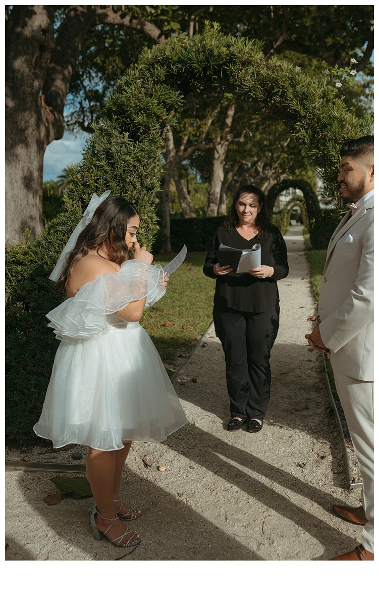 bride reading vows during elopement ceremony