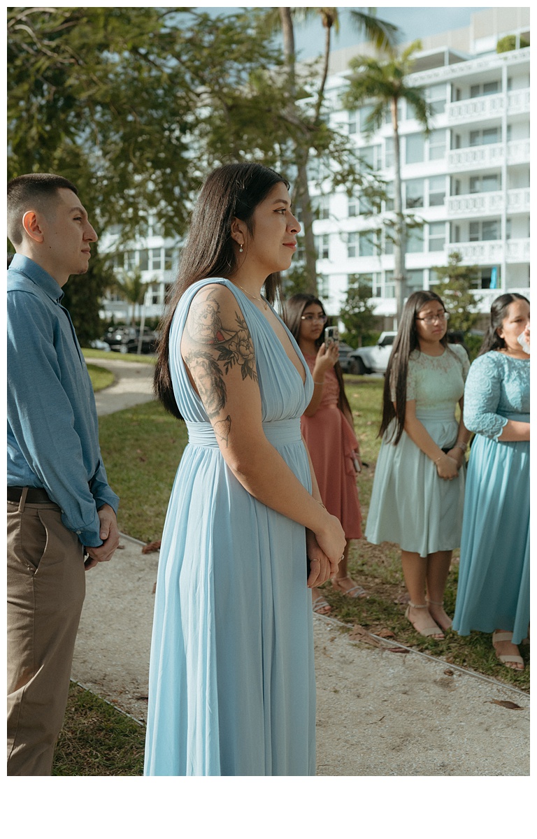 emotional grooms sister during ceremony