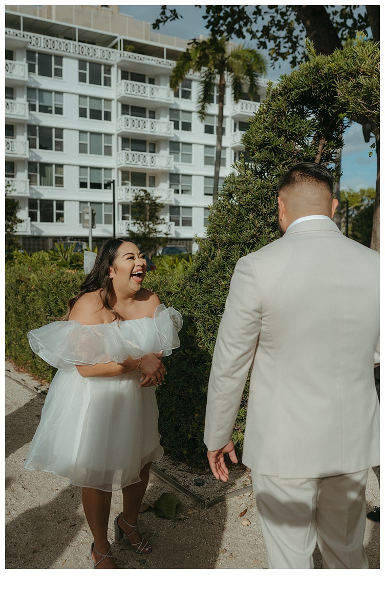 bride laughing during elopement ceremony