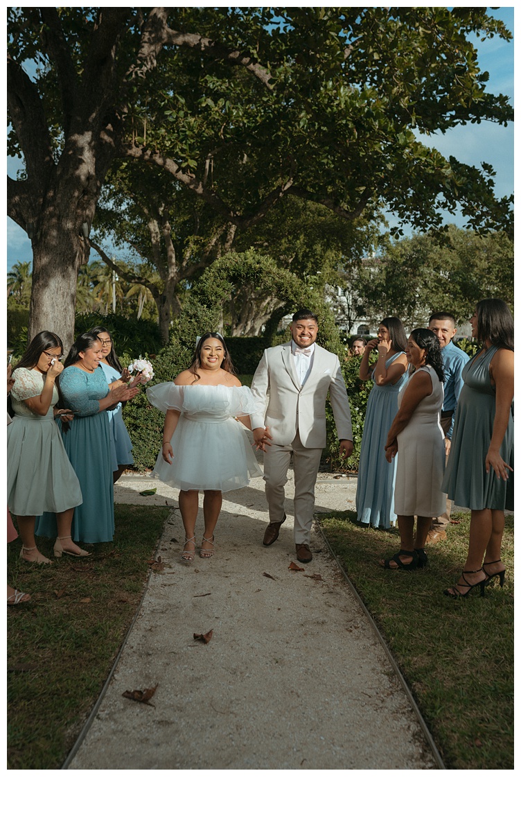 bride and groom walking down aisle after elopement ceremony