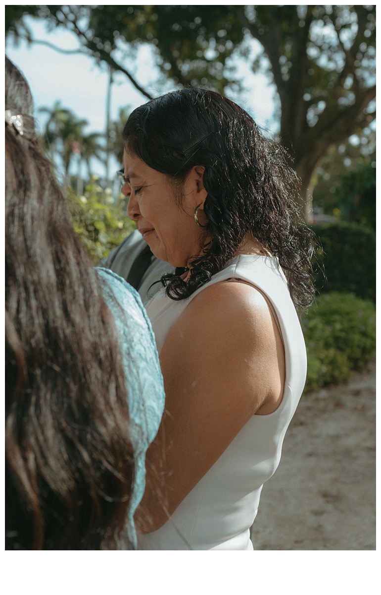 groom mom crying during prayer