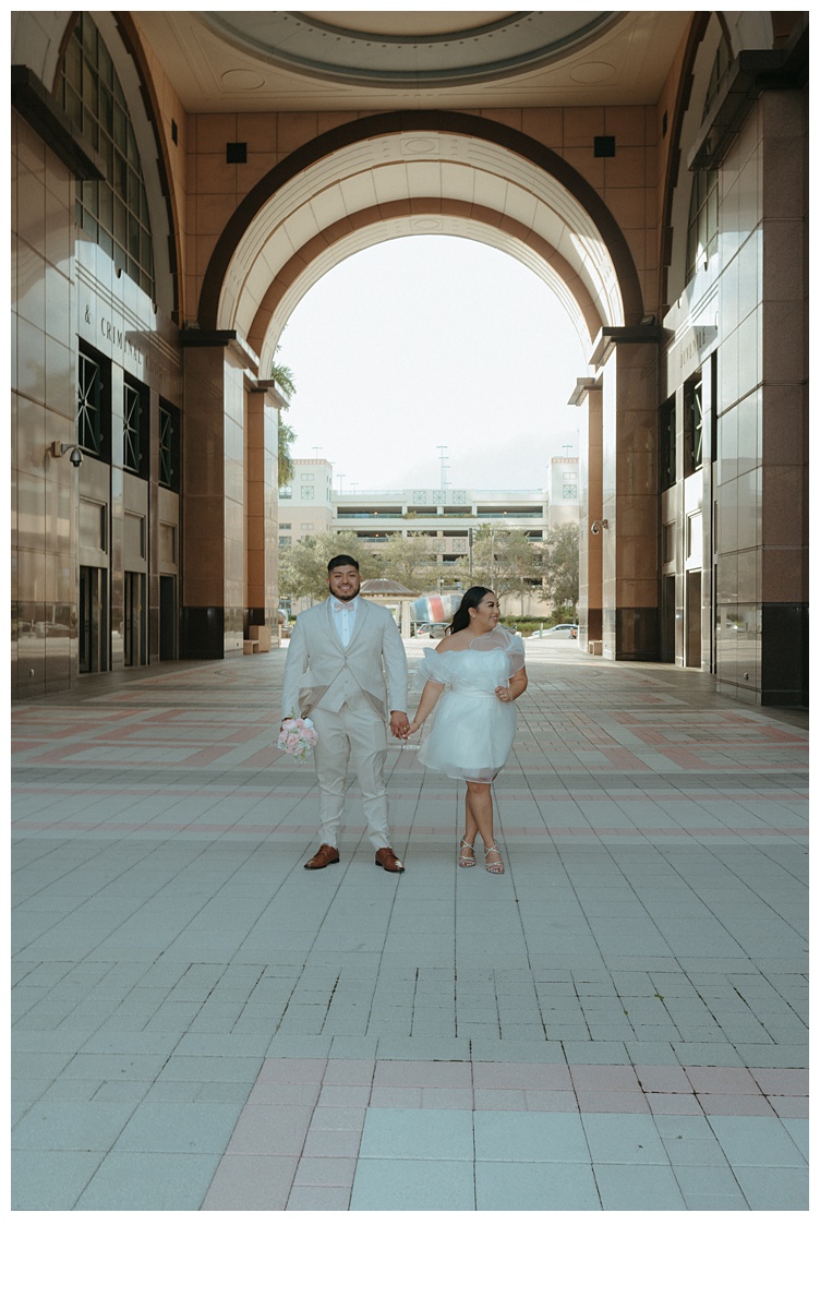 bride and groom fun pose after elopement