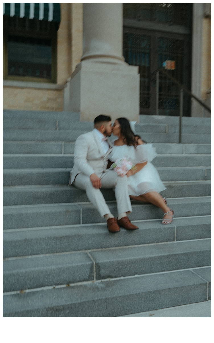 blurry and unique photo of bride ans groom kissing