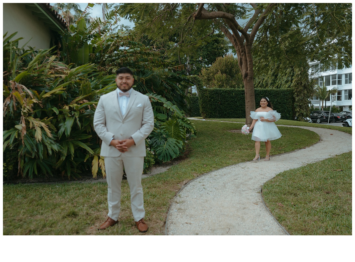 bride and groom first look in the park