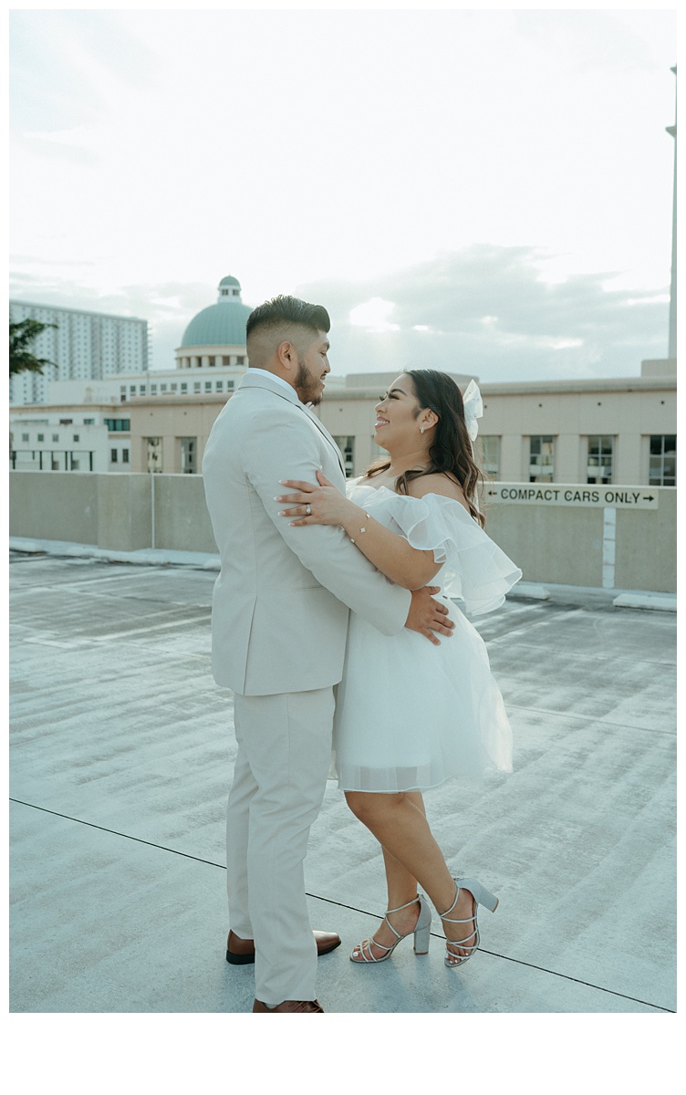 eloped couple on rooftop parking garage