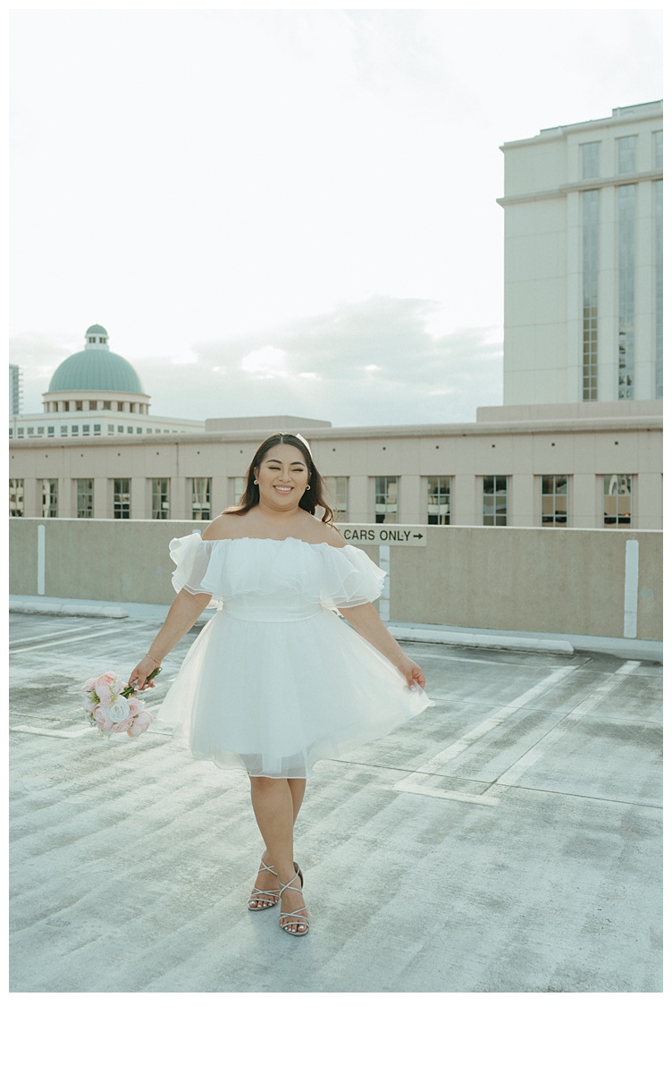 fun bride photo twirling her dress