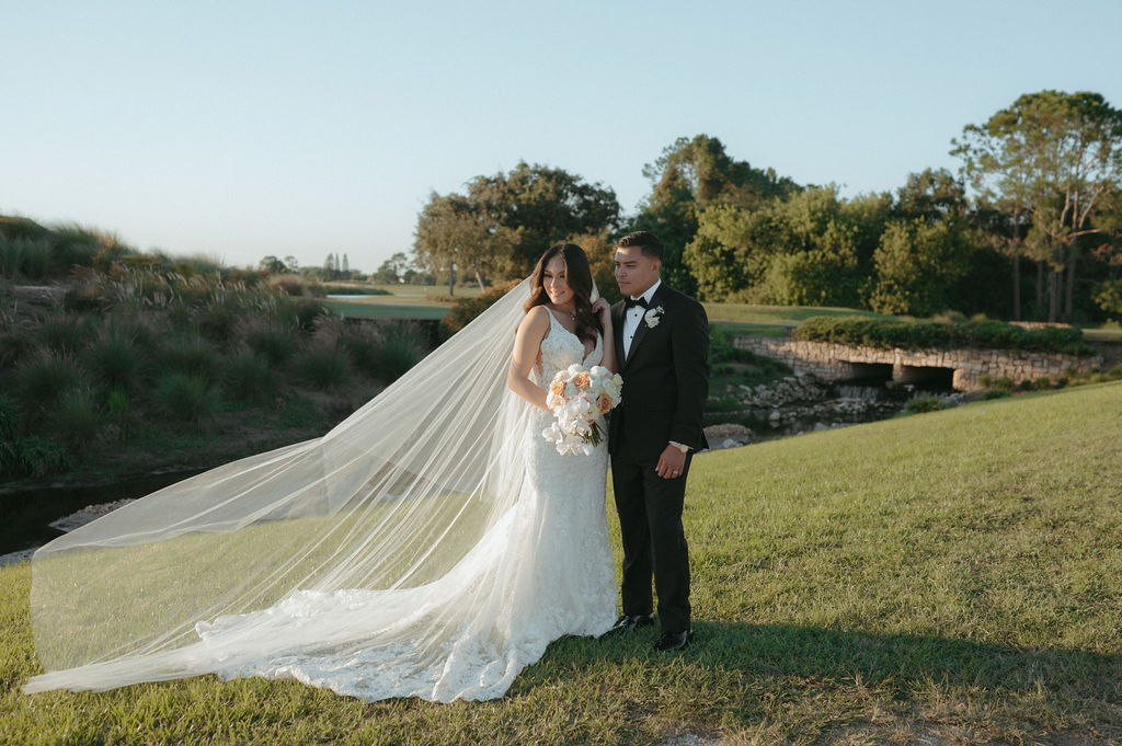 Bride and groom portraits during golden hour at their wedding at The Royal Crest Room in Florida