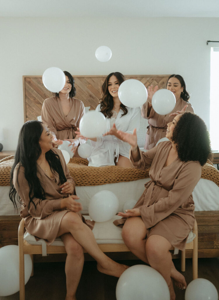 Bride & Bridesmaids getting ready on wedding day