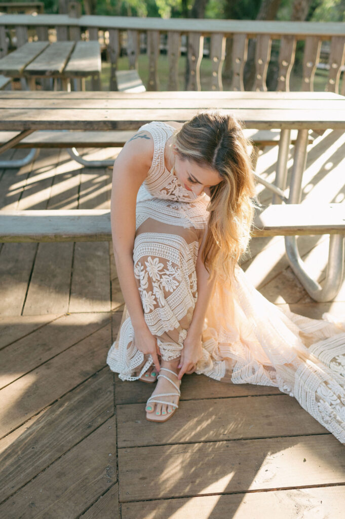 Bride getting ready before her elopement at Kelly Park Springs in Florida