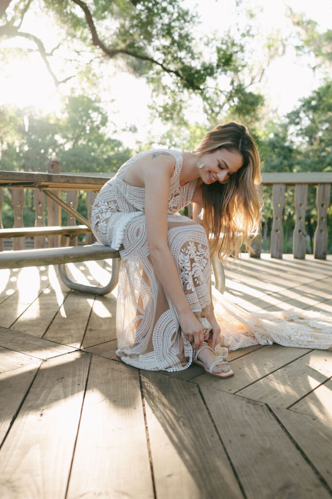 Bride getting ready before her elopement at Kelly Park Springs in Florida