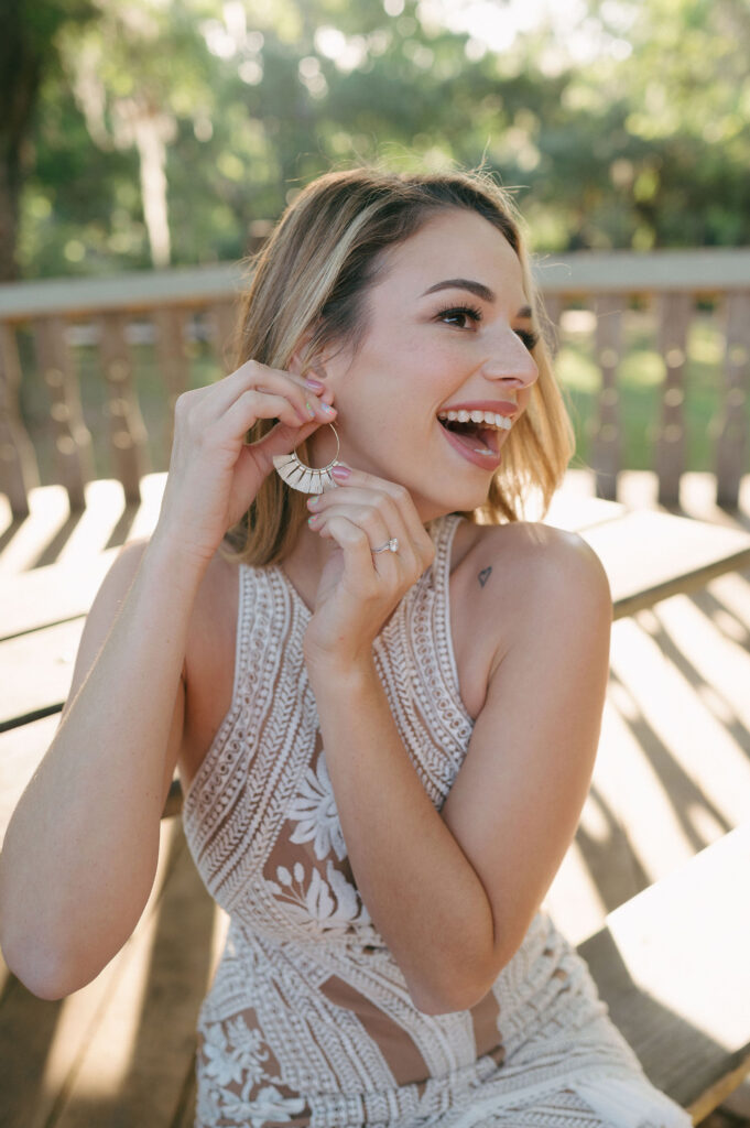 Bride getting ready before her elopement at Kelly Park Springs in Florida