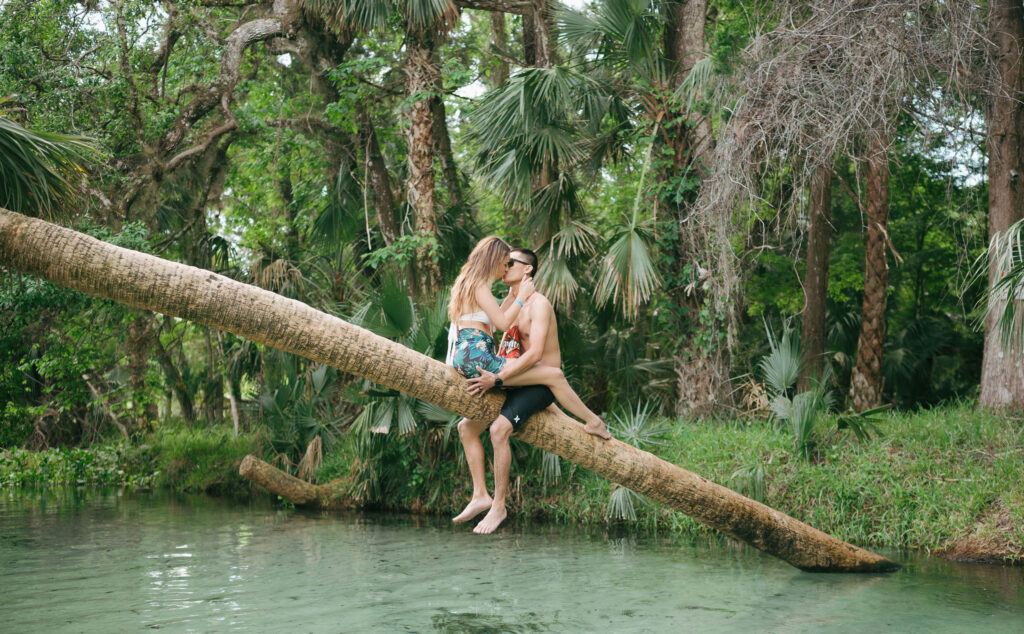 Intimate elopement photos in swimsuits at Kelly Park Springs in Florida