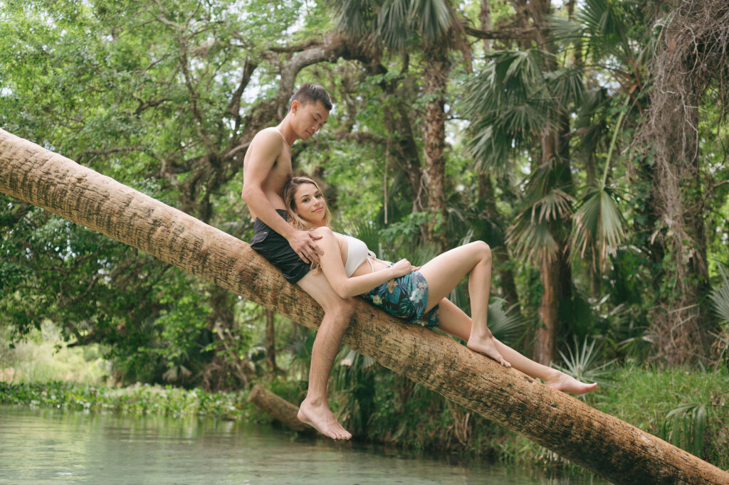 Intimate elopement photos in swimsuits at Kelly Park Springs in Florida